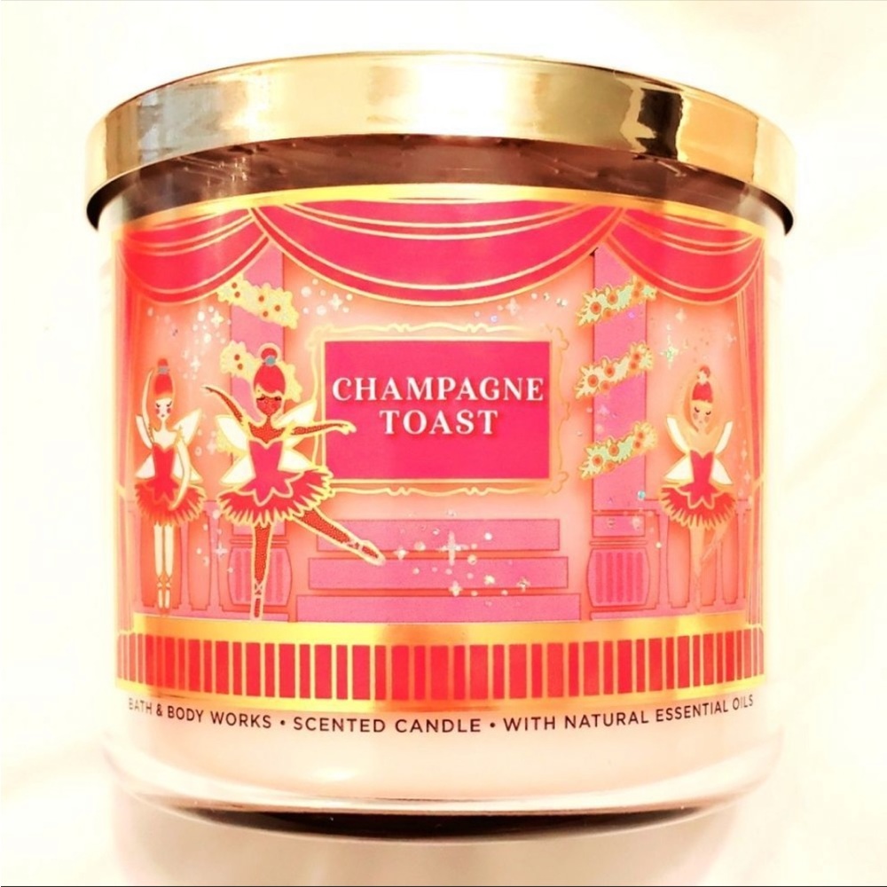 NWT Bath & Body Works Champagne Toast Candle 3 Wicks hints of bubbly champagne.